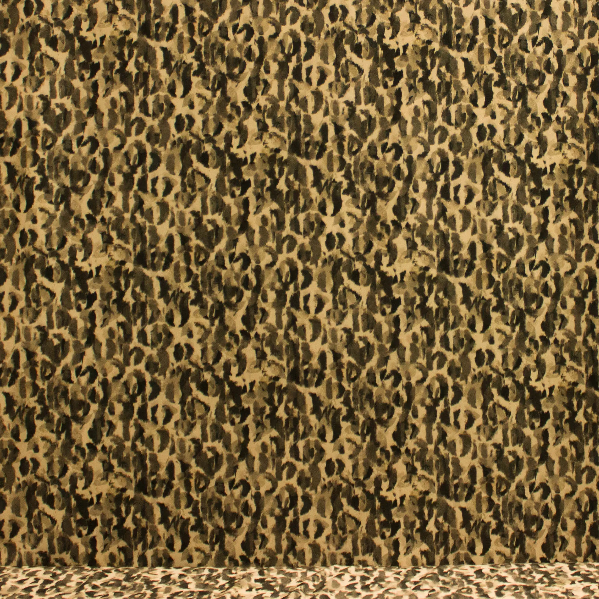 Polyester crêpe tricot beige met vlekkenpatroon
